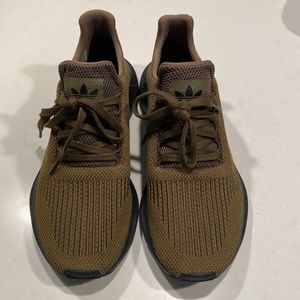 Army green adidas swift sneakers